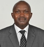 DR. THOMAS OCHUKU MBUYA