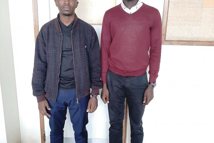 Alfred Muchangi (left) and Solomon Orwa who received UoN scholarships.