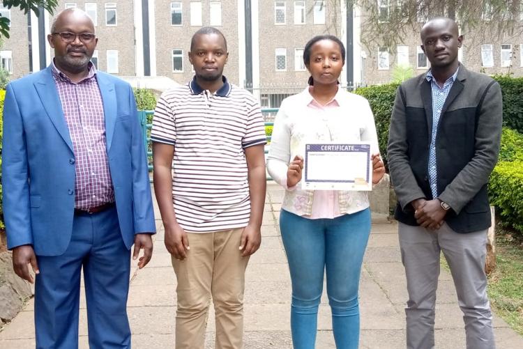 Dr. Thomas Ochuku- Chairman of the department of Mechanical and Manufacturing Engineering, University of Nairobi and Supervisor, together with  Too Kipng'eno Robert (MSc. Mechanical Engineering UoN)- In pollo T-shirt; Angel Nyokabi Gacheru (Undergraduate Mechanical Engineering- UoN) and Chrispoi Ouko Zamzu (MSc. Mechanical Engineering- Pan African University-JKUAT